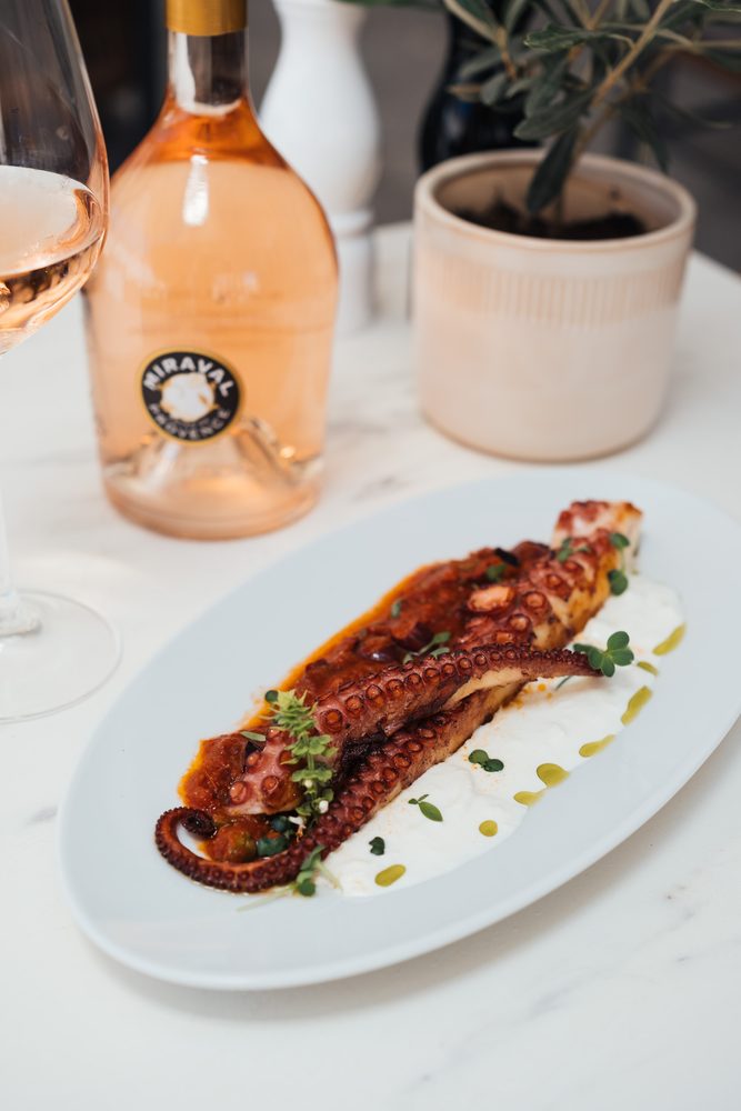 Charcoal-grilled octopus and a bottle of Provence rosé at Salon 1875